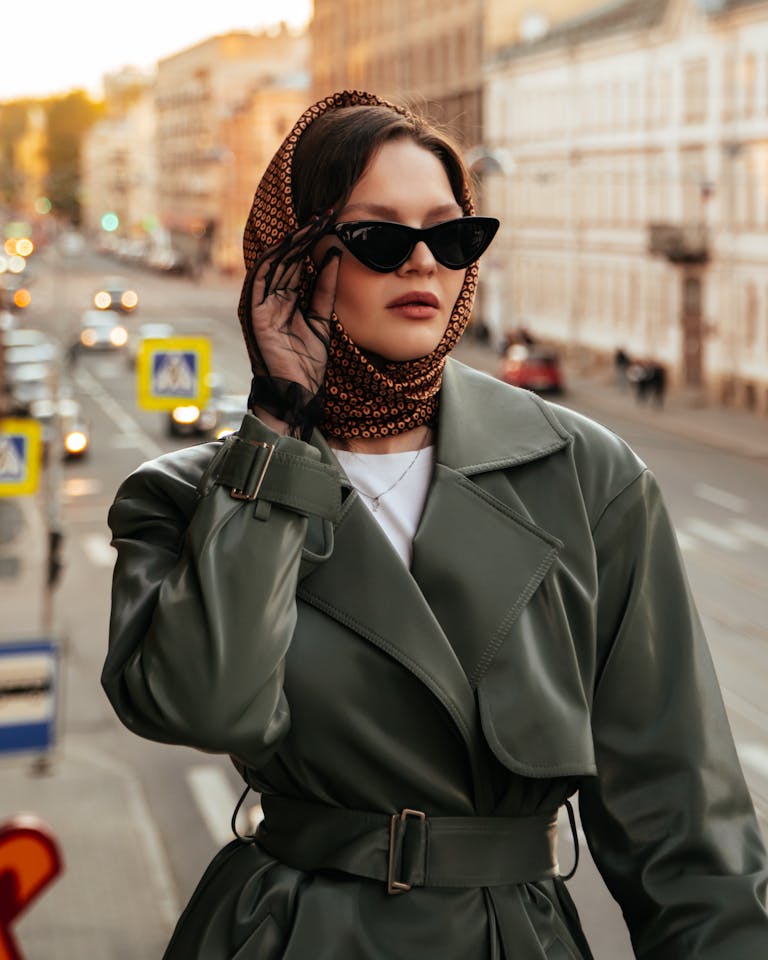 Stylish woman posing on a city street in Saint Petersburg.