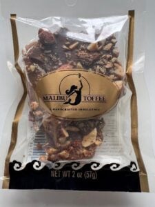 Clear bag of Malibu Toffee with chocolate and nuts