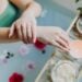 A serene spa experience with flowers, candles, and a relaxing bath. Perfect for self-care and relaxation.