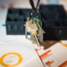 House-shaped keychain hanging from a key ring